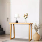 Tavolino consolle in legno massello da 110 cm con gambe trapezoidali