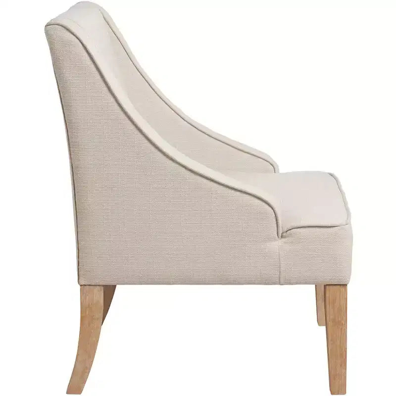 Poltrona Dixon Ivory in tessuto con braccioli ricurvi